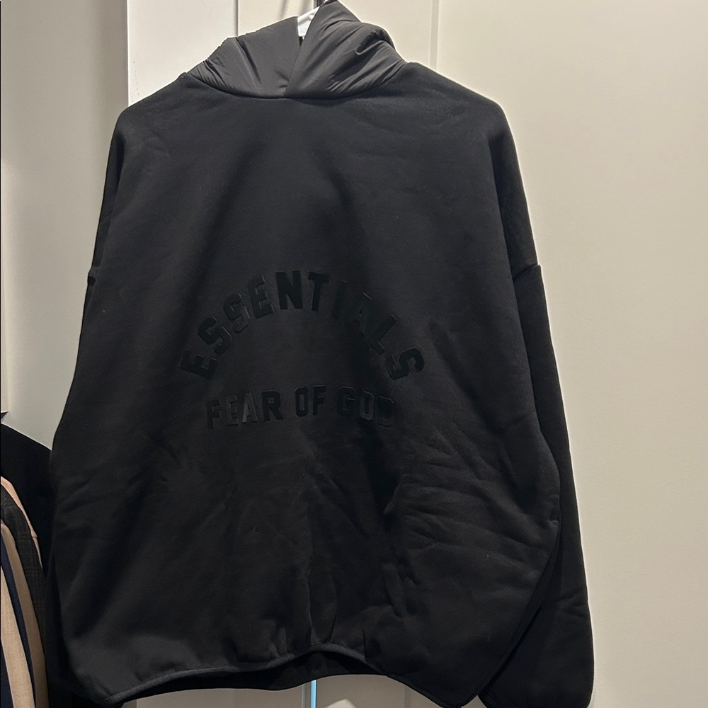 Fear of God Essentials Black Pullover hood lined with Satin and Pockets.